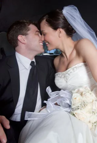 Groom and bride in a limo